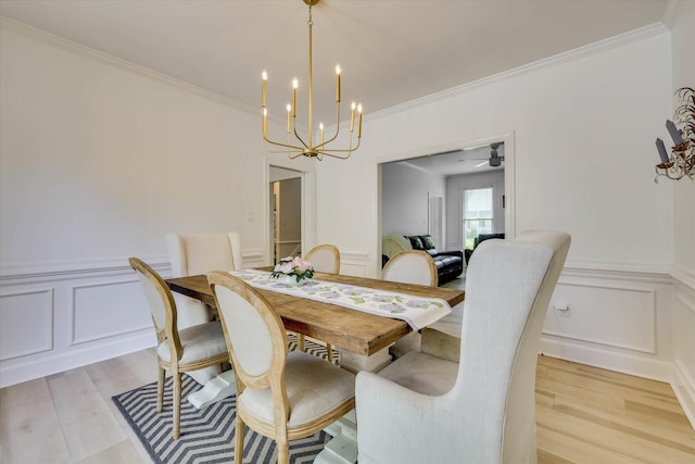3555 Watervale Way, Martinez, GA 30907 - dining room featuring a chandelier, a decorative wall, ornamental molding, light wood-style flooring, and a wainscoted wall
