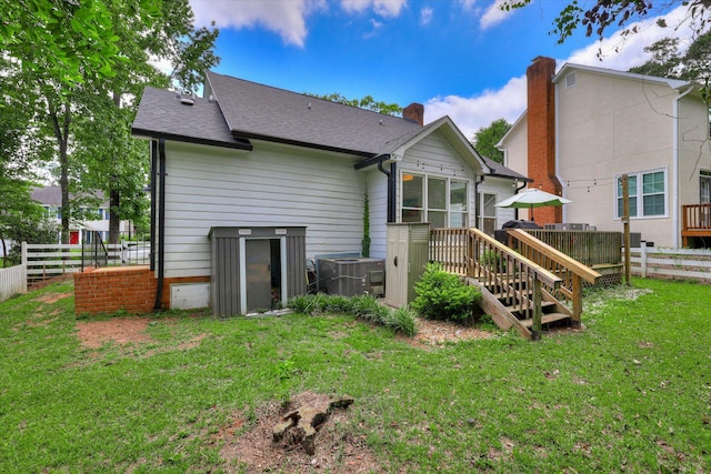 3555 Watervale Way, Martinez, GA 30907 - rear view of house with central AC, a wooden deck, and roof with shingles