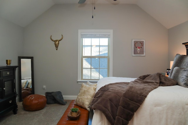 bedroom featuring ceiling fan, carpet floors, and vaulted ceiling