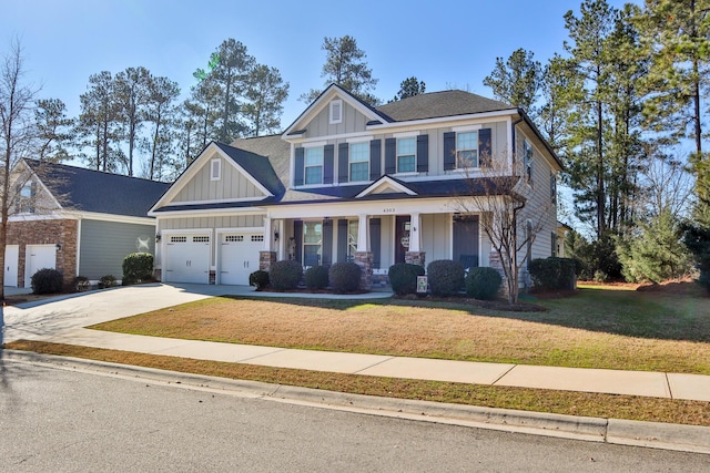 craftsman-style house featuring a front yard