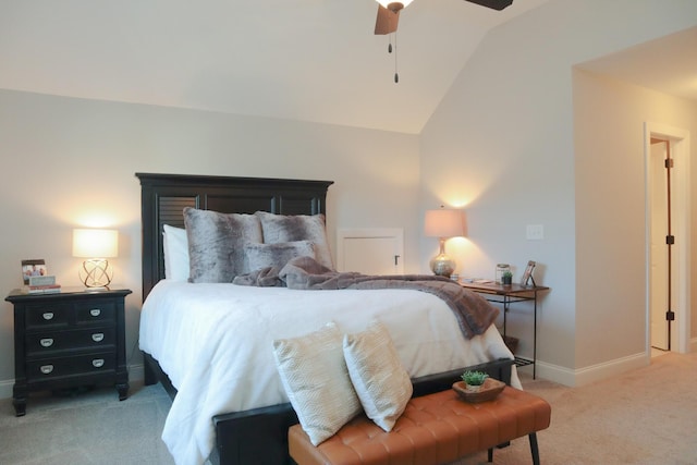 bedroom featuring light carpet, ceiling fan, and vaulted ceiling