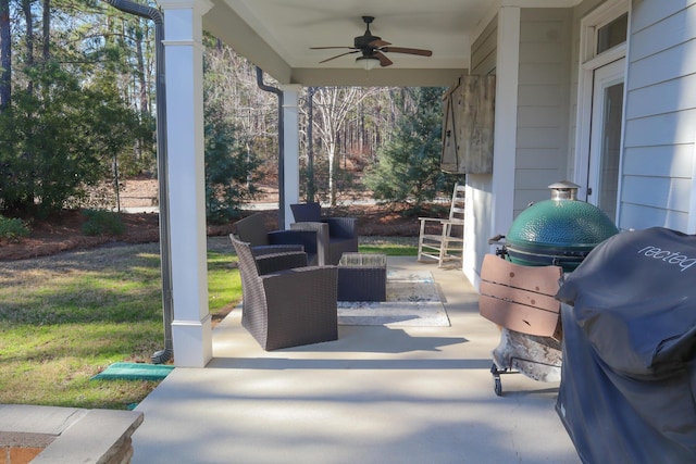 view of patio with ceiling fan and a grill