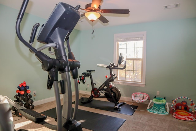 workout room featuring ceiling fan