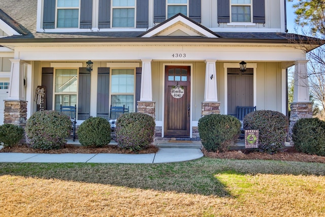 property entrance featuring covered porch