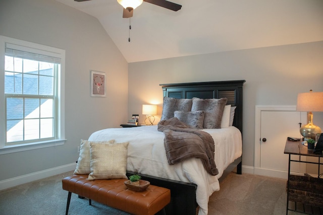 bedroom with ceiling fan, light colored carpet, multiple windows, and lofted ceiling