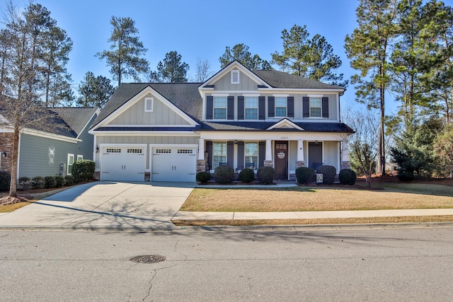 craftsman-style home with a front lawn and a garage