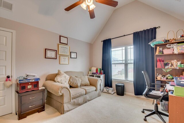 office area with ceiling fan, lofted ceiling, and light carpet