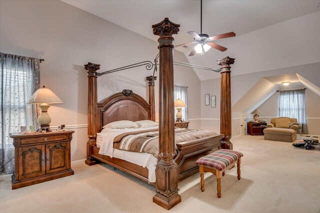 bedroom featuring ceiling fan, carpet floors, and vaulted ceiling