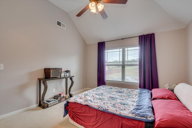 bedroom featuring carpet floors, ceiling fan, and lofted ceiling