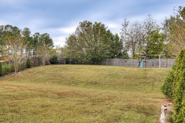 view of yard featuring a playground