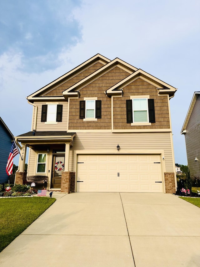 942 Newburn Dr, North Augusta, SC 29860 - craftsman-style house featuring a garage, driveway, a porch, and brick siding