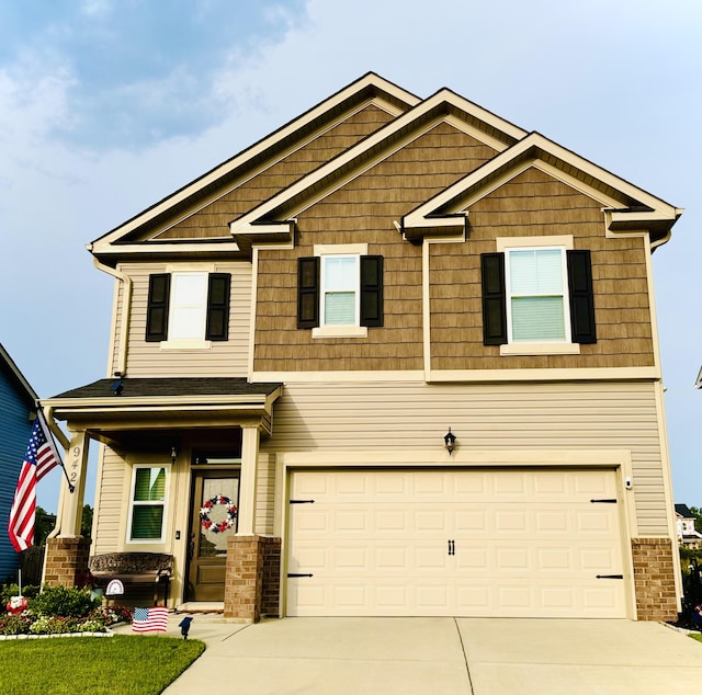 942 Newburn Dr, North Augusta, SC 29860 - craftsman inspired home featuring an attached garage, driveway, and covered porch