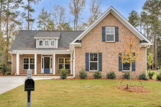 view of front of home with a front lawn