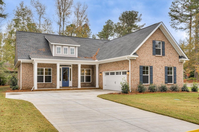 view of front facade featuring a garage and a front lawn