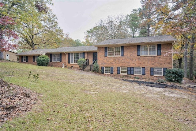 view of front of home with a front lawn