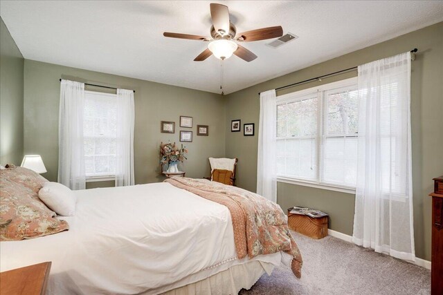 bedroom with carpet and ceiling fan