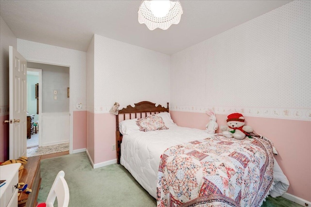 bedroom featuring light colored carpet