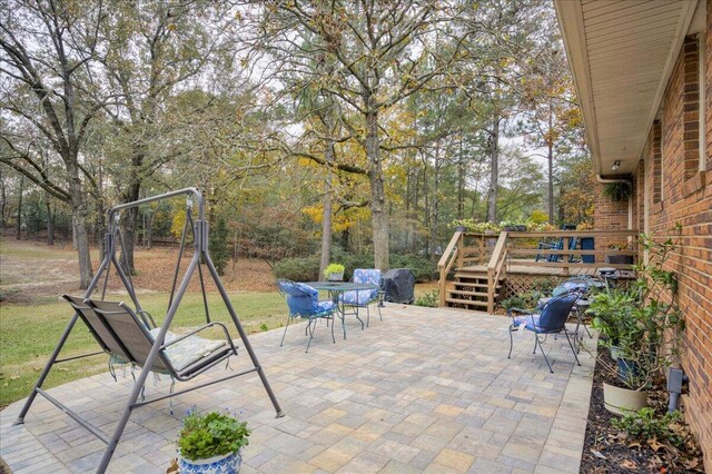 view of patio / terrace featuring a deck