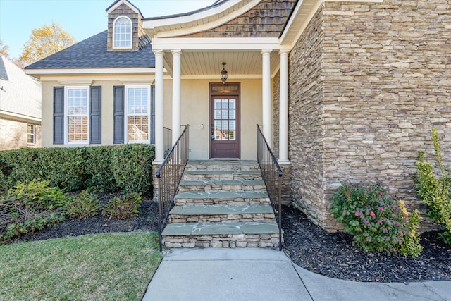 doorway to property with covered porch