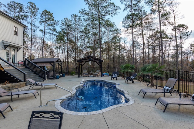 5416 Old Washington Rd, Evans, GA 30809 - view of pool with a gazebo, stairs, a fenced backyard, a patio, and view of scattered trees