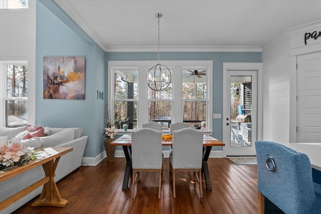 5416 Old Washington Rd, Evans, GA 30809 - dining room featuring a chandelier, healthy amount of natural light, dark wood-type flooring, and ornamental molding