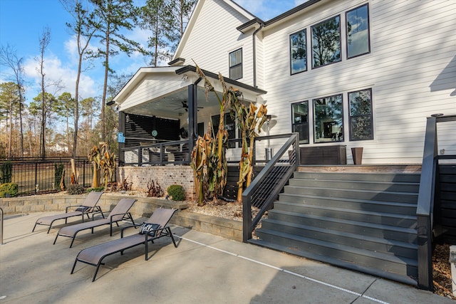 5416 Old Washington Rd, Evans, GA 30809 - back of property with a ceiling fan, stairs, and a patio