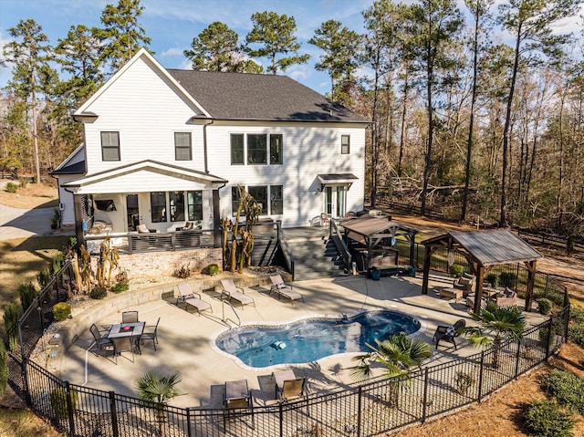 5416 Old Washington Rd, Evans, GA 30809 - rear view of property featuring a gazebo, a fenced backyard, a shingled roof, and a patio