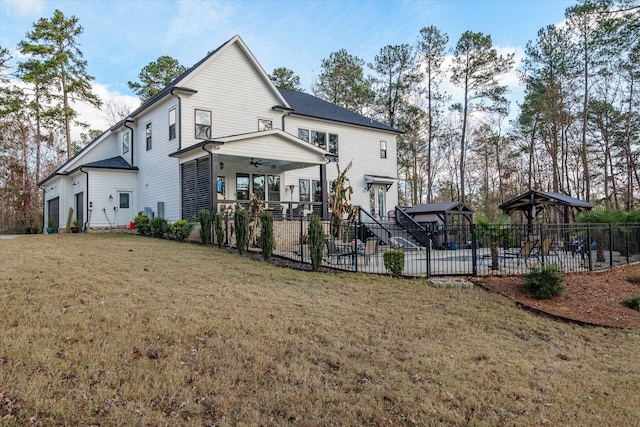 5416 Old Washington Rd, Evans, GA 30809 - back of property with a ceiling fan