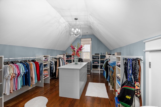 5416 Old Washington Rd, Evans, GA 30809 - spacious closet with dark wood-style flooring, lofted ceiling, and a chandelier