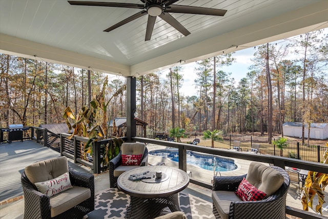 5416 Old Washington Rd, Evans, GA 30809 - wooden terrace featuring an outdoor hangout area, a fenced backyard, a ceiling fan, and view of wooded area