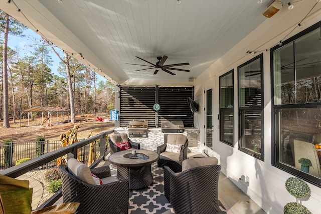 5416 Old Washington Rd, Evans, GA 30809 - view of patio featuring ceiling fan, an outdoor kitchen, and an outdoor living space
