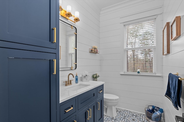 5416 Old Washington Rd, Evans, GA 30809 - bathroom with vanity, tile patterned flooring, wooden walls, and ornamental molding