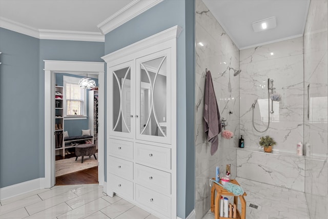 5416 Old Washington Rd, Evans, GA 30809 - bathroom featuring ornamental molding, a marble finish shower, marble finish floors, and a walk in closet