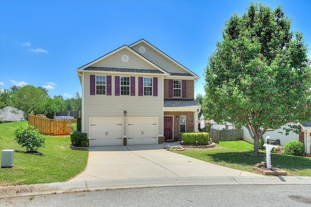 324 Congling Cir, Grovetown, GA 30813 - traditional-style home with a garage, driveway, and brick siding