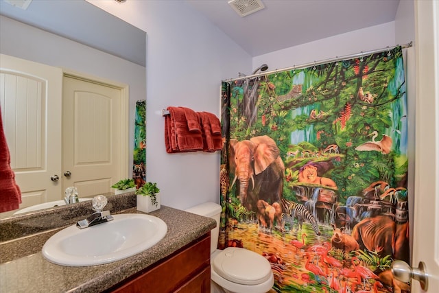 324 Congling Cir, Grovetown, GA 30813 - bathroom featuring vanity, toilet, and a shower with curtain