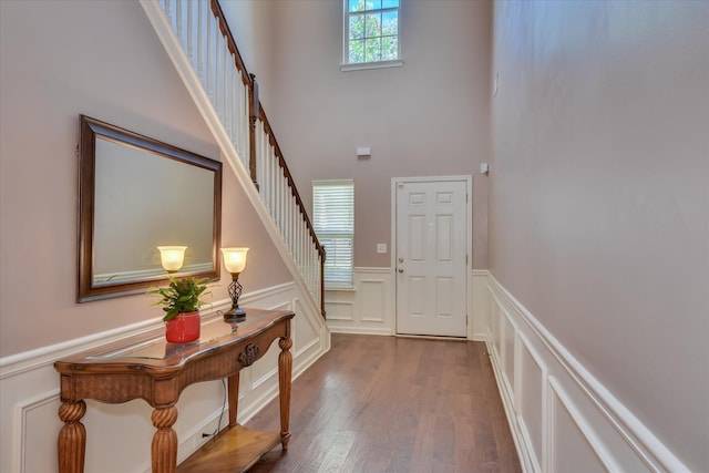 324 Congling Cir, Grovetown, GA 30813 - foyer with a high ceiling, a decorative wall, stairway, wood finished floors, and a wainscoted wall