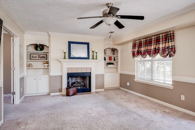 unfurnished living room with a textured ceiling, built in shelves, and carpet