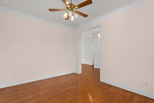 empty room with crown molding, ceiling fan, and hardwood / wood-style floors