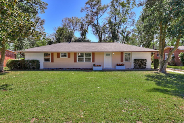 ranch-style house with a front yard