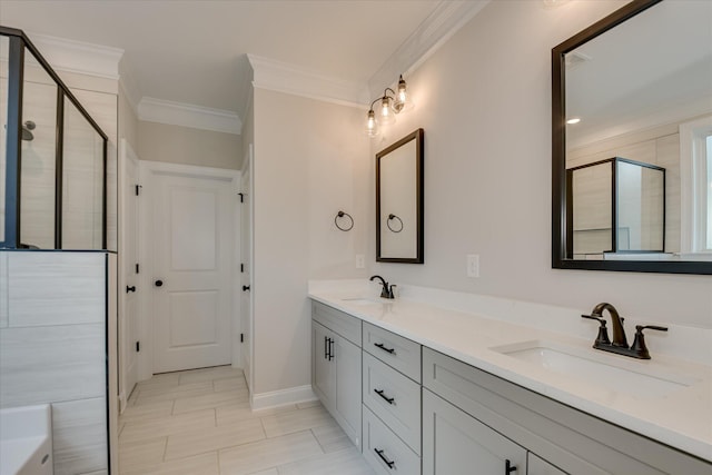 full bathroom featuring a sink, crown molding, a stall shower, and double vanity