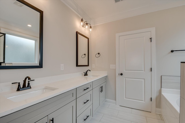 full bathroom with double vanity, visible vents, ornamental molding, and a sink