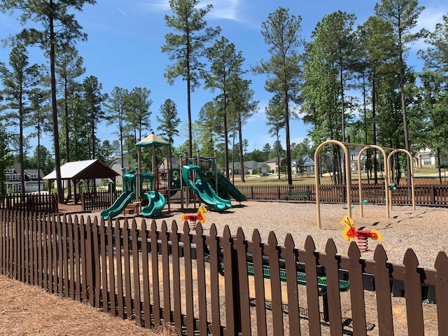 community jungle gym with fence