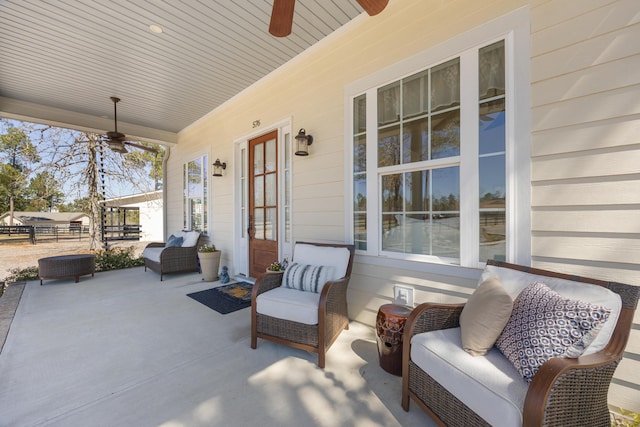 view of patio with covered porch and ceiling fan