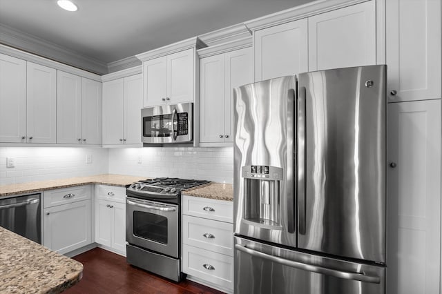 884 Willow Lk, Evans, GA 30809 - kitchen with light stone counters, white cabinetry, tasteful backsplash, appliances with stainless steel finishes, and dark wood-type flooring