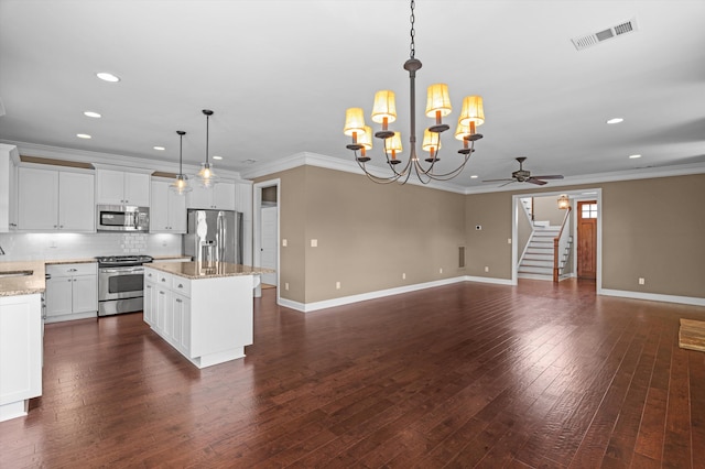884 Willow Lk, Evans, GA 30809 - kitchen featuring appliances with stainless steel finishes, open floor plan, visible vents, and recessed lighting