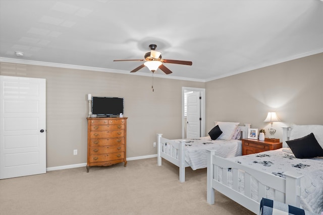 carpeted bedroom featuring crown molding and ceiling fan