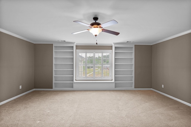 884 Willow Lk, Evans, GA 30809 - carpeted empty room featuring built in features, a ceiling fan, visible vents, baseboards, and ornamental molding