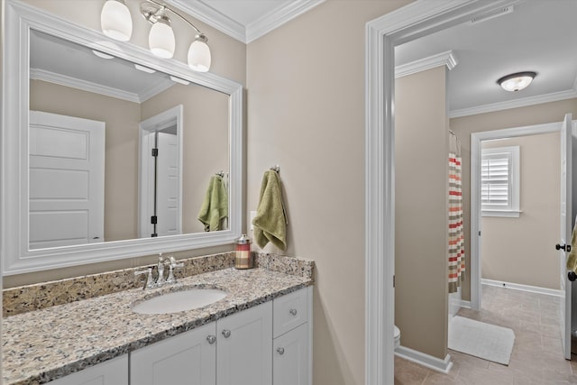 bathroom featuring crown molding, vanity, tile patterned floors, and toilet