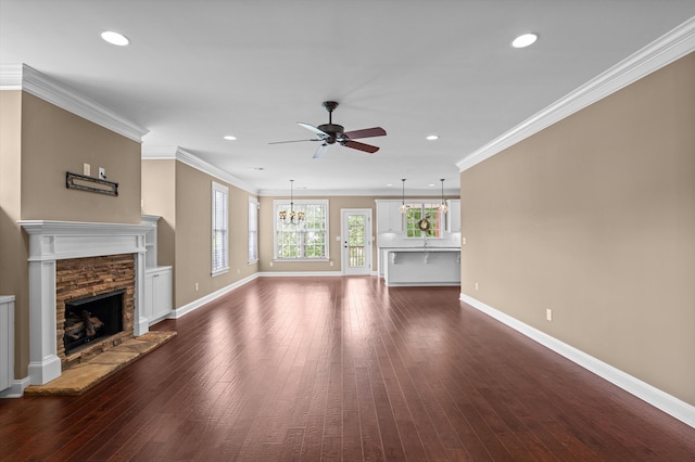 884 Willow Lk, Evans, GA 30809 - unfurnished living room featuring recessed lighting, a fireplace, baseboards, hardwood / wood-style floors, and ceiling fan with notable chandelier
