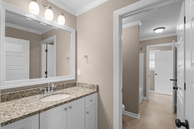 884 Willow Lk, Evans, GA 30809 - full bath featuring toilet, vanity, baseboards, tub / shower combination, and crown molding